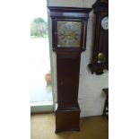 An oak eight day striking longcase clock with 12 inch square brass dial with secondary dial and