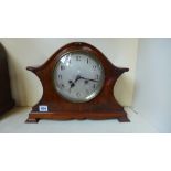 An Art Nouveau Junghams walnut striking mantle clock with pendulum and key - Height 29cm