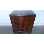 A 20th century mahogany serpentine four drawer chest - Height 79cm x Width 71cm x Depth 45cm