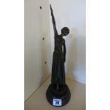 A bronze reproduction sculpture of a flapper - Height 33cm on circular marble base