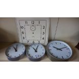 Three slave wall clocks 9 inch and 12 inch diameter and an IBM dial 15 inches x 15 inches