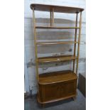 An Ercol blonde elm room divider with two adjustable shelves and two base cupboard doors - Height