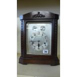 An eight day oak case bracket clock by Junhams,