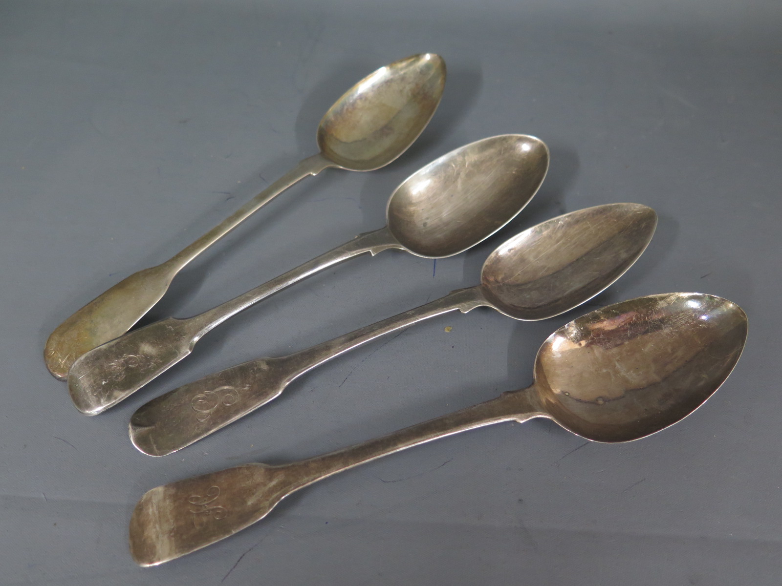 Four silver table spoons approx weight 8.