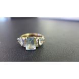 An aquamarine and diamond dress ring - Stamped 375 - Ring size N 1/2 - Weight approx 3.