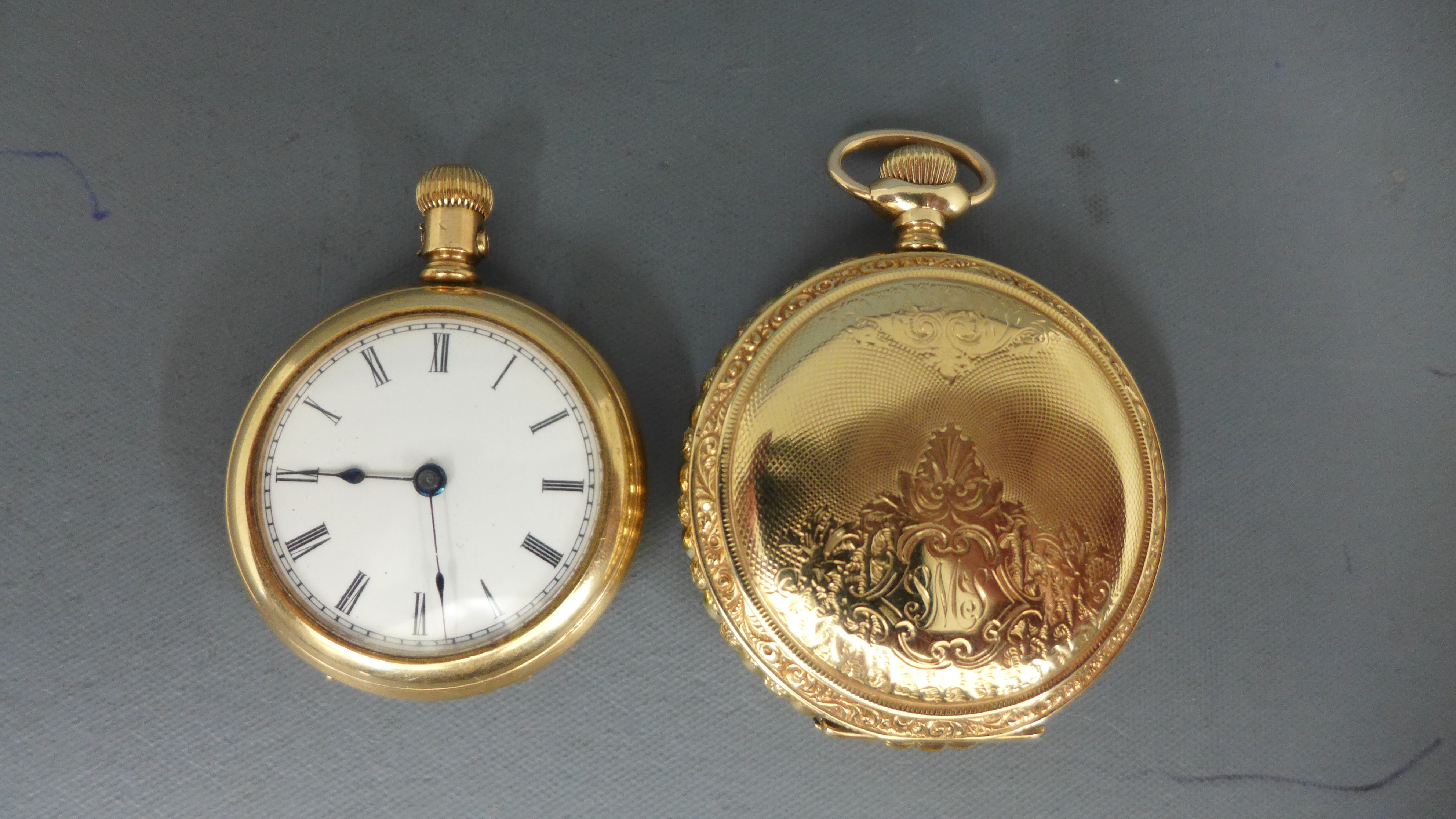 A ladies gold plated pocket watch, open faced by Elgin Watch Co USA,