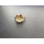 A 9ct gold citrine single-stone ring - Hallmarked London - Ring size I 1/2 - Weight approx 2.