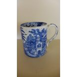 A 19th century Leeds Pottery blue and white transfer decorated tankard - Height 14cm - two cracks