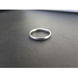 A platinum band ring - Hallmarked London - Ring size O 1/2 - Weight approx 3.