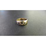 A 9ct gold sapphire three-stone band ring - Hallmarked Birmingham - Ring size K 1/2 - Weight approx