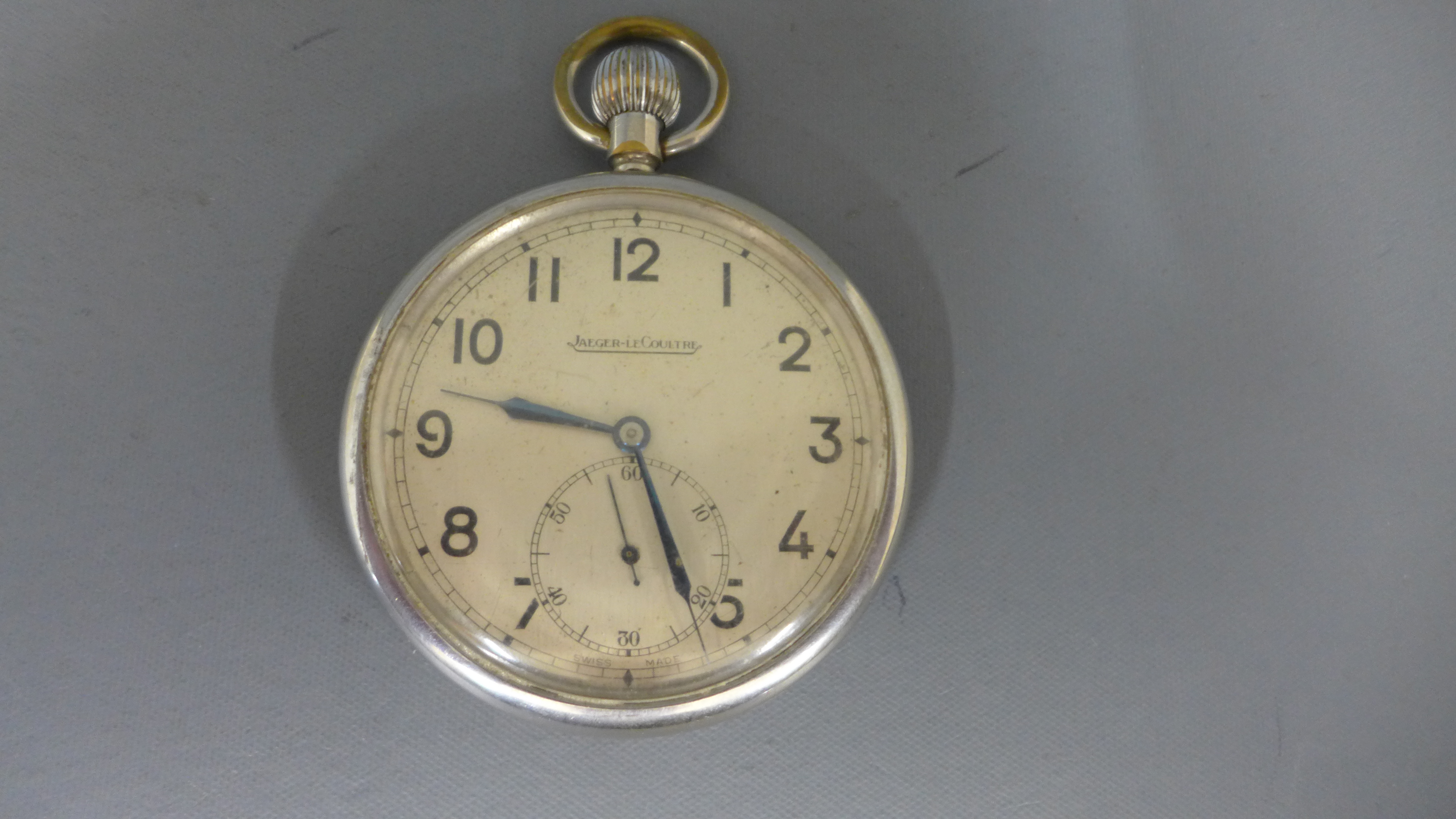 A chrome cased Jaeger Le Coultre pocket watch Arabic numerals to dial with subsidiary second hand