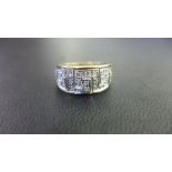 A 9ct gold diamond band ring - Of Greek Key design - Hallmarked Birmingham - Ring size Q 1/2 -