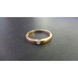 A 9ct gold diamond tension-set ring - Hallmarked Birmingham - Ring size T 1/2 - Weight approx 2.