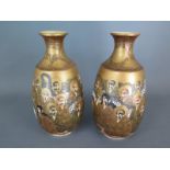 A pair of late 19th/early 20th century satsuma bottle vases - Height 18.