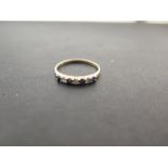 A sapphire and diamond seven-stone ring - Stamped 14k - Ring size M 1/2 - Weight approx 1.