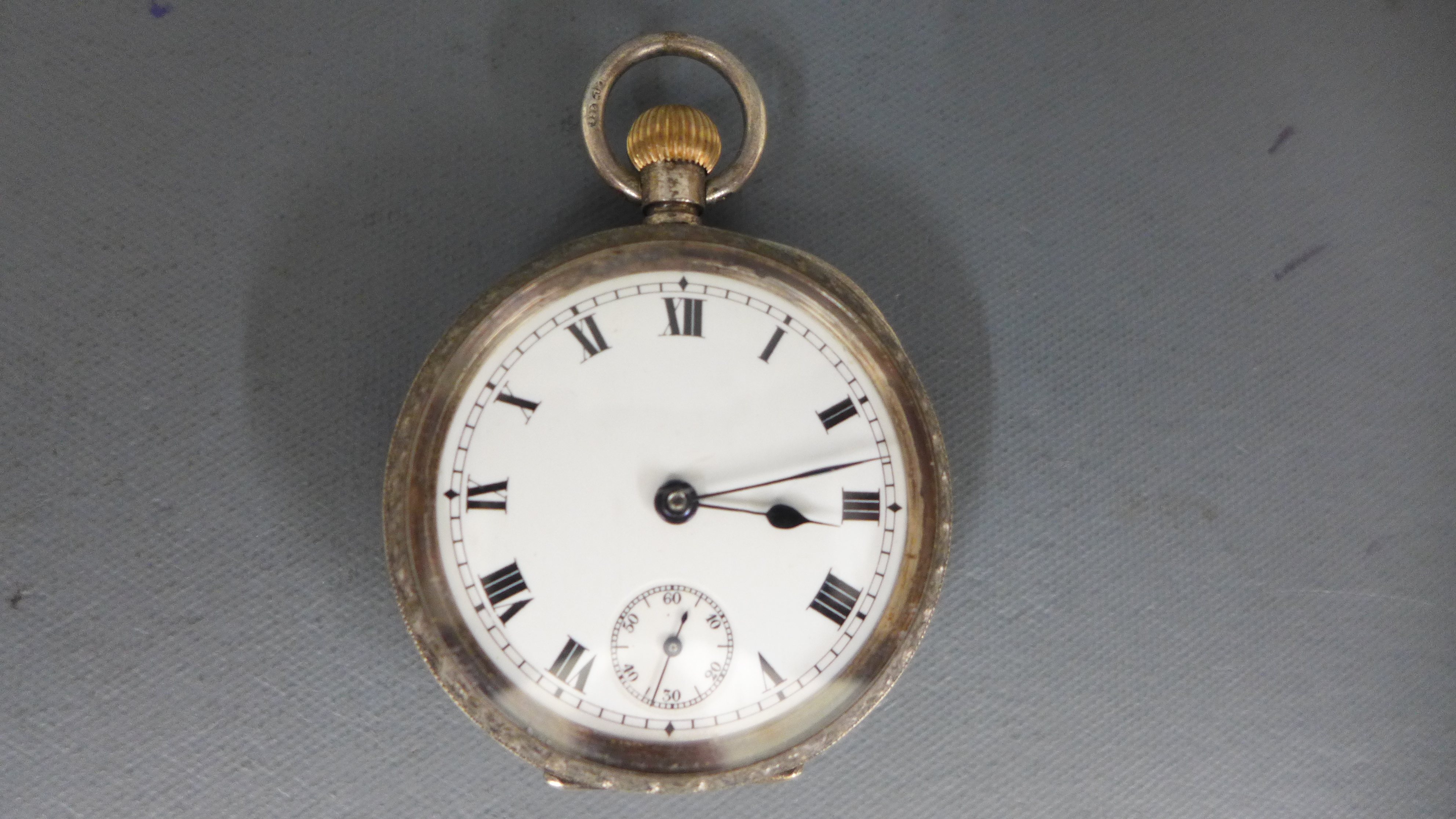 A ladies silver hallmarked cased Omega pocket watch Roman numerals to dial with subsidiary second