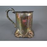 A silver hallmarked tankard engraved with initials to cartouche at front,