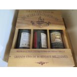 A box containing three 75cl red wines La Collection 96 du Musee des Chartrons