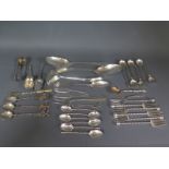 A selection of Continental silver items including spoons, teaspoons, small pickle forms,