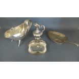 Four pieces of Peruvian sterling silver - two jugs,