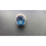 A 9ct gold topaz and diamond ring - Hallmarked Birmingham - Ring size N - Weight approx 4.