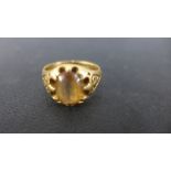 An 18ct yellow gold ring with citrine to shoulder - Size T - Weight approx. 9.