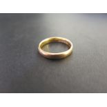 A 22ct gold band ring - Hallmarked Birmingham - Ring size N - Weight approx 4.