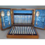 A canteen of silver plated flatware including twelve knives,
