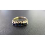 A 9ct gold sapphire five-stone ring - Hallmarked Edinburgh - Ring size N 1/2 - Weight approx 2.