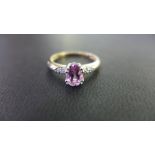 A topaz and diamond dress ring - Hallmarked London - Ring size P 1/2 - Weight approx 2.