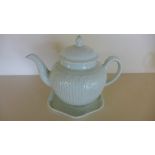 An 18th century creamware teapot on stand probably Liverpool - Height 16cm - good