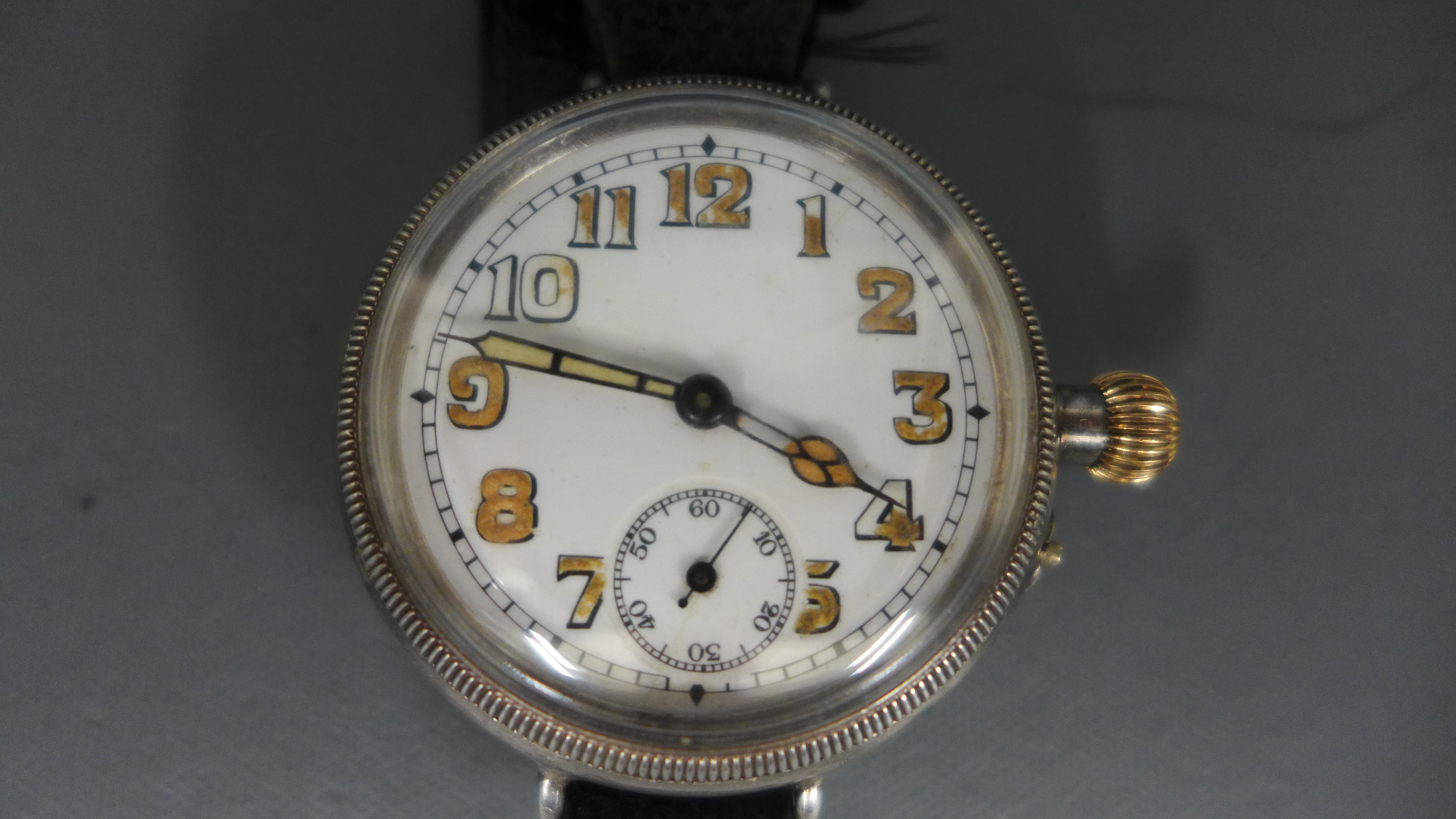 A World War One silver cased trench watch with Arabic numerals to white enamel circular dial, - Image 2 of 3