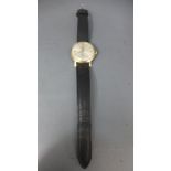 A gentleman's 9ct yellow gold cased wristwatch by Garrard,