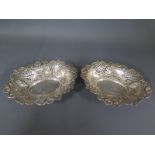 A pair of silver hallmarked bon-bon dishes of pierced foliate design,