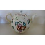 An 18th century creamware teapot with apple and pear decoration possibly Cockpit Hill Derby - chips