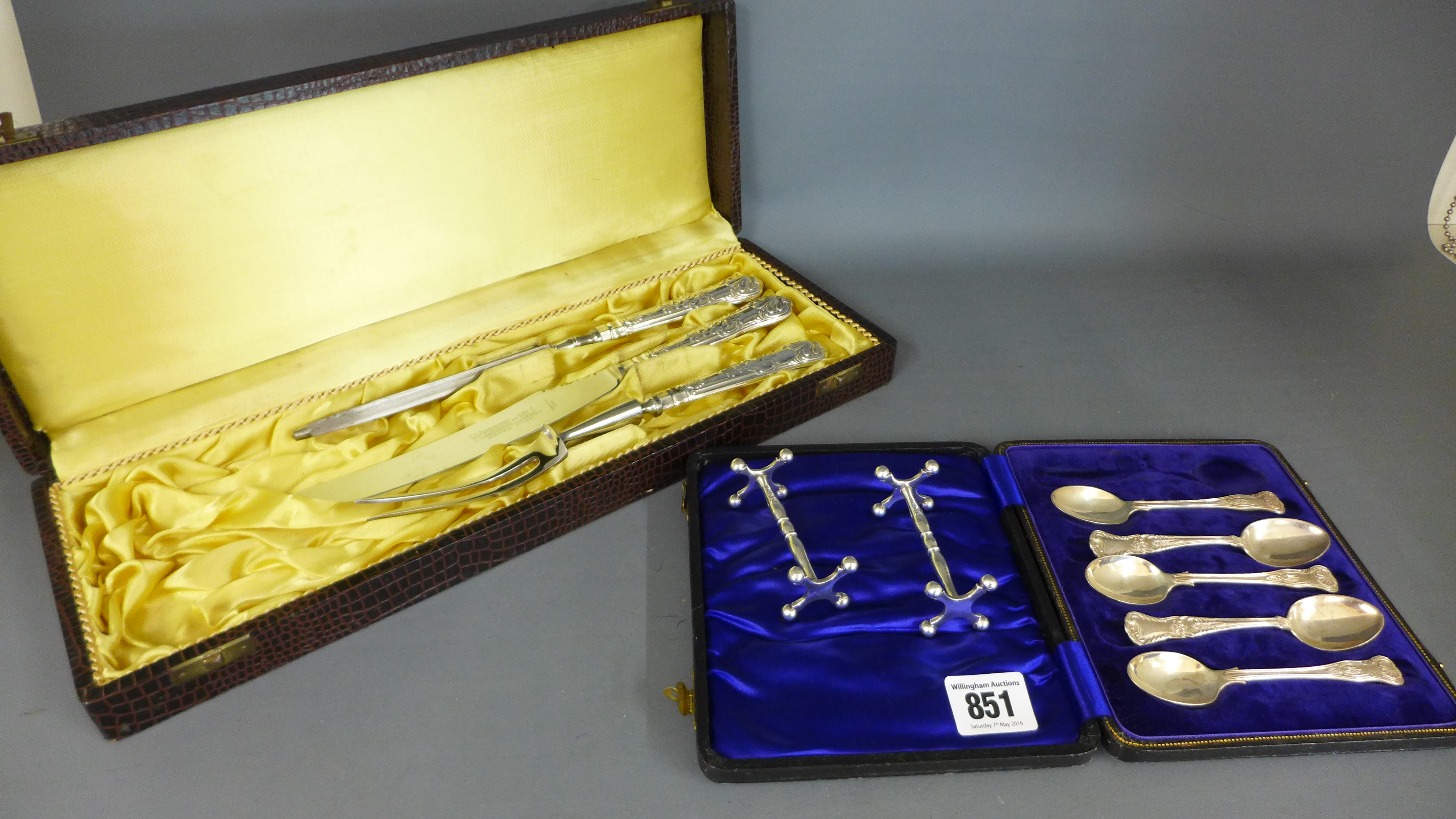 A boxed three piece silver handled Webber and Hill carving set,