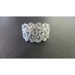 A 9ct gold diamond openwork band ring - Hallmarked Birmingham - Ring size P 1/2 - Weight approx 3.