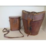 A Victorian leather double top hat box by Johnson and a binocular case - both have wear consistent