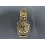 A 9ct gold cased mid sized wristwatch by Record,