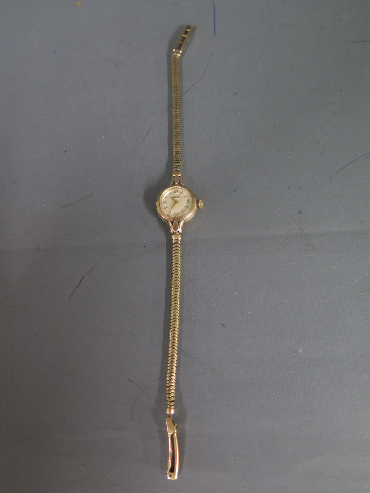 A ladies 9ct gold Longines wristwatch with bracelet hallmarked for 1960 with 17 jewel movement