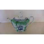 An 18th/19th century Liverpool teapot with blue and white chinoiserie decorated and green