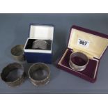 Five silver serviette rings approx weight 4 troy oz