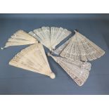 A collection of ivory and bone fans - damage to one fan and ribbon loose
