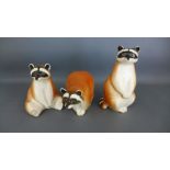 Three Russian ceramic raccoons the tallest being 15cm in height - no damage to items