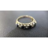 A 9ct gold yellow gold half eternity ring size N - approx weight 1.