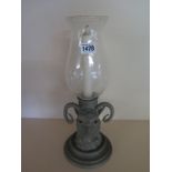A 20th century MIKA rams head candle stick with tulip glass insert - Height 37cm Provenance: