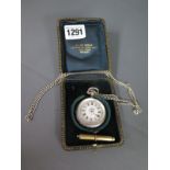 A silver pocket watch Eustace Durran with a chain and a brass pencil - working,