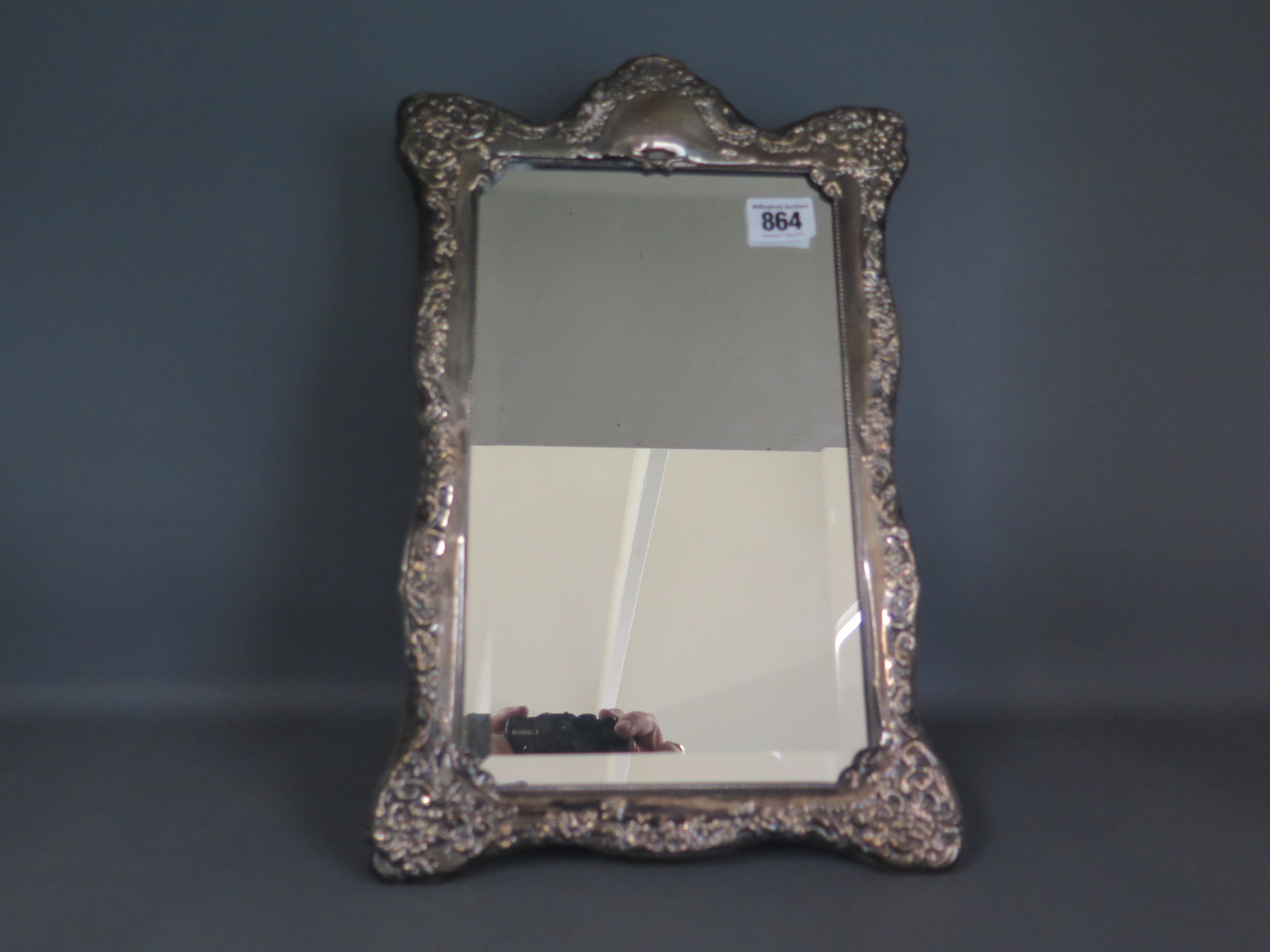 A silver embossed mirror maker RC - 37cm x 24cm - overall good condition