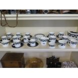 A Susie Cooper for Wedgewood porcelain black keystone tea and coffee service comprising tea pot,