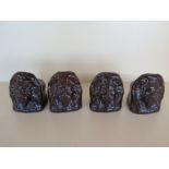 Four 19th century treacle glaze lion window rests - some minor chips Provenance: Sherford House,